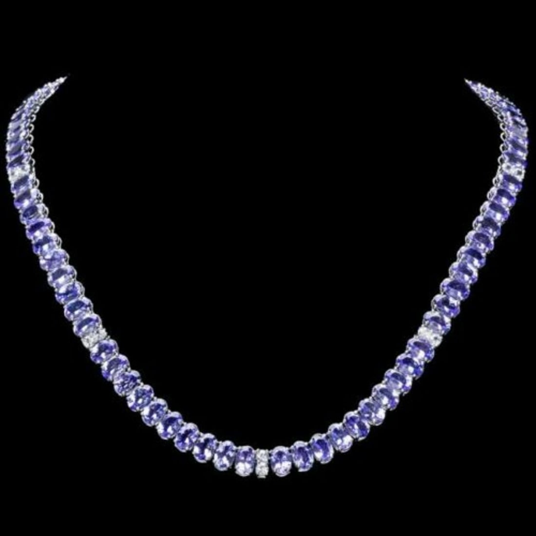 14K White Gold 52.80ct Tanzanite and 1.75ct Diamond Necklace: Retail: $39,872.00 ****** 14K White Gold 52.80ct Tanzanite and 1.75ct Diamond Necklace ****** Metal: 14K White Gold / Total Item Weight: 35.5 Grams / Country Made: United States / / Main Stone: