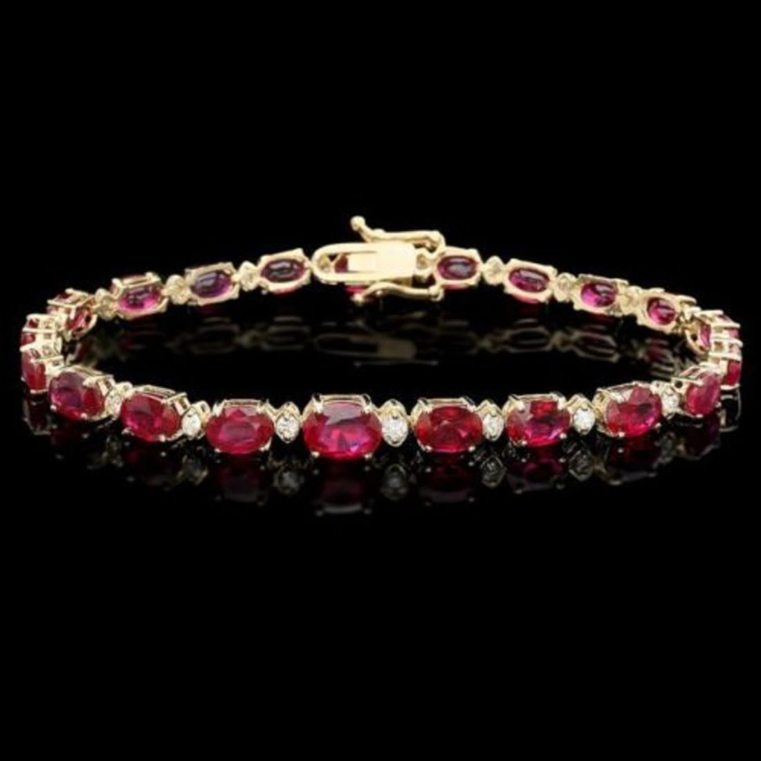 14K Gold 16.71ct Ruby 0.69ct Diamond Bracelet: Retail: $8,725.00 ****** 14K Gold 16.71ct Ruby 0.69ct Diamond Bracelet ****** Metal: 14K Yellow Gold / Total Item Weight: 11.0 Grams / Country Made: United States / / Main Stone: Ruby / Color: Red /