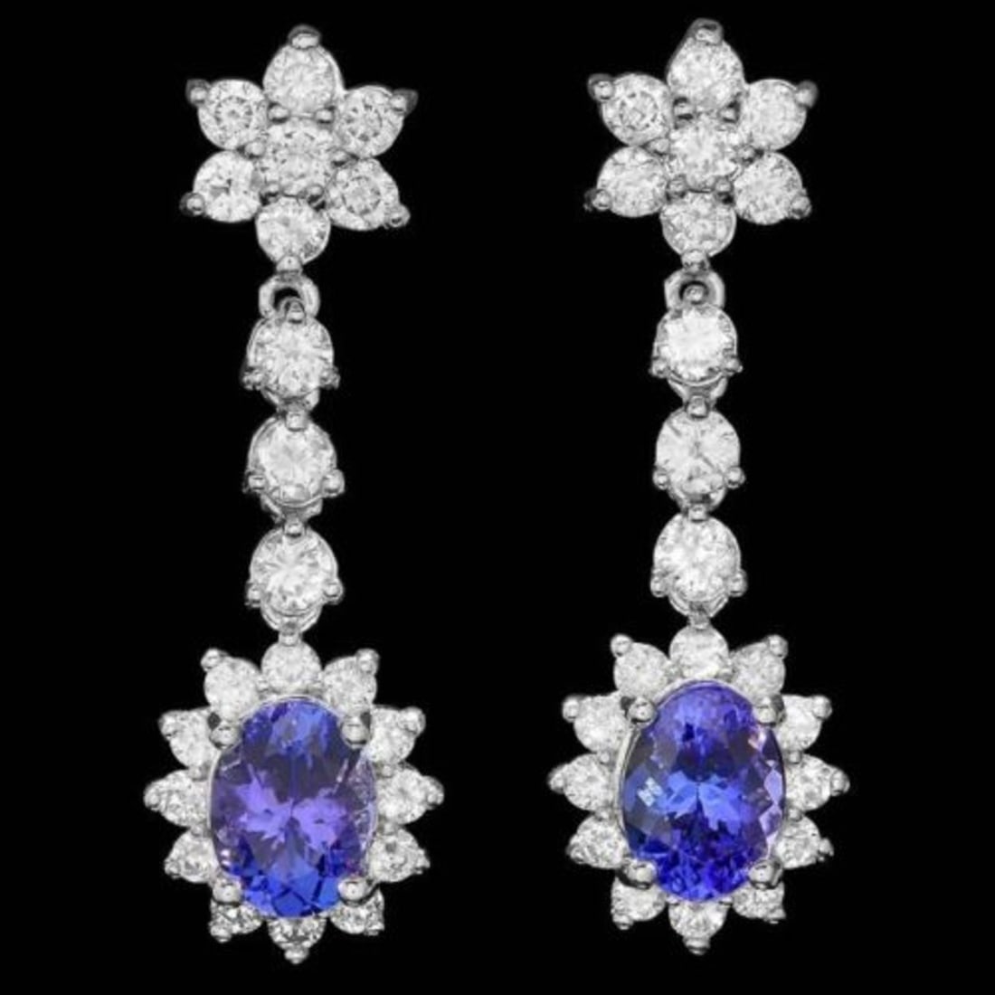 14k Gold 3.21ct Tanzanite 2.17ct Diamond Earrings: Retail: $12,900.00 ****** 14k Gold 3.21ct Tanzanite 2.17ct Diamond Earrings ****** Metal: 14k Solid White Gold / Total Item Weight: 5.0 grams / Country Made: United States / / Main Stone: Tanzanite /