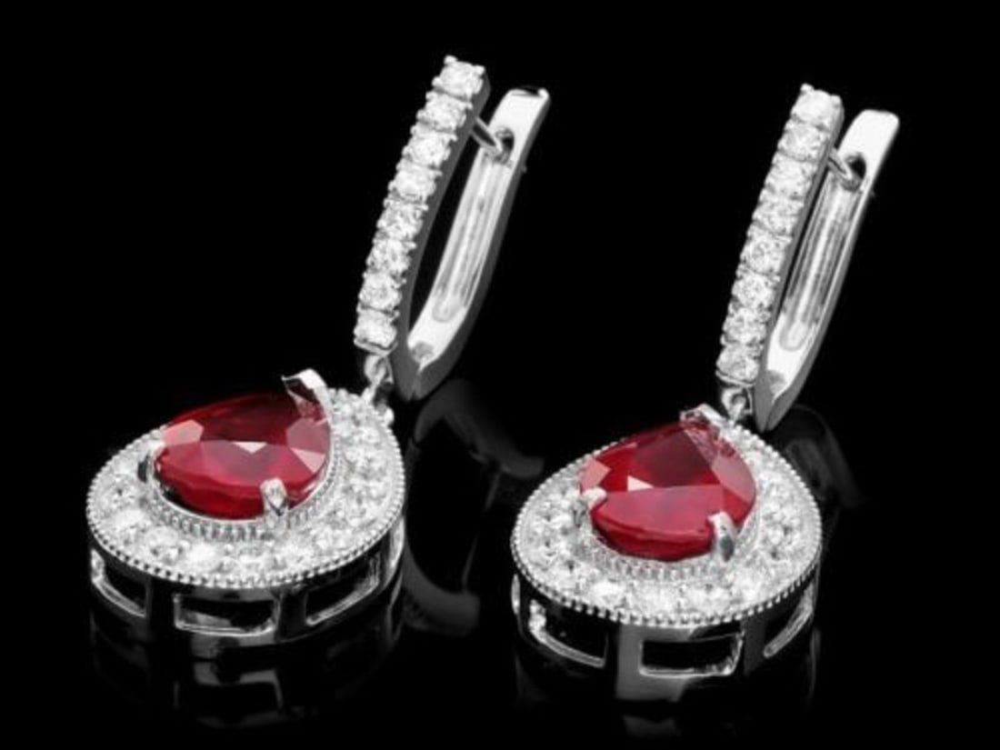 14k Gold 6.63ct Ruby 1.69ct Diamond Earrings: Retail: $11,200.00 ****** 14k Gold 6.63ct Ruby 1.69ct Diamond Earrings ****** Metal: 14k Solid White Gold / Total Item Weight: 8.5 grams / Country Made: United States / / Main Stone: Ruby / Color: Red