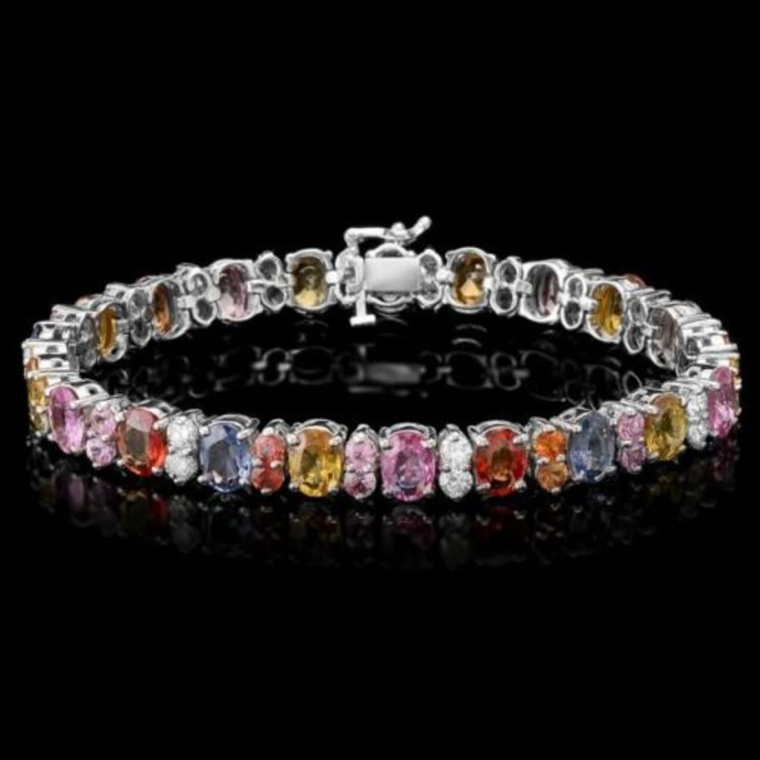 14K Gold 23.22ct Sapphire 1.64ct Diamond Bracelet: Retail: $18,321.00 ****** 14K Gold 23.22ct Sapphire 1.64ct Diamond Bracelet ****** Metal: 14K White Gold / Total Item Weight: 24.5 Grams / Country Made: United States / / Main Stone: Sapphire / Color: