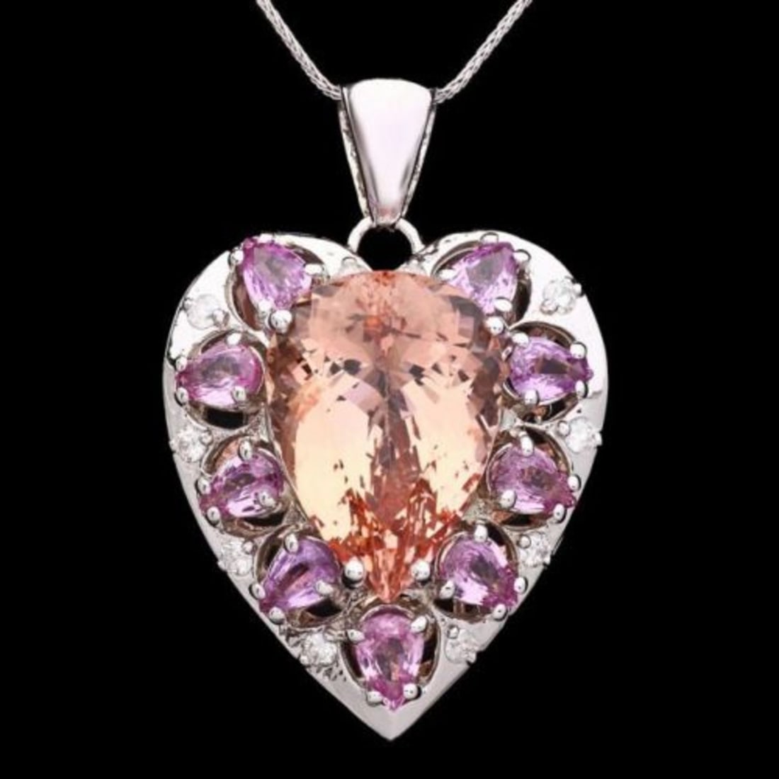 14K Gold 15ct Morganite 3.82ct Sapphire 0.45ct Diamond Pendant: Retail: $14,640.00 ****** 14K Gold 15ct Morganite 3.82ct Sapphire 0.45ct Diamond Pendant ****** Metal: 14K White Gold / Total Item Weight: 17.5 Grams / Country Made: United States / / Main Stone: Morg