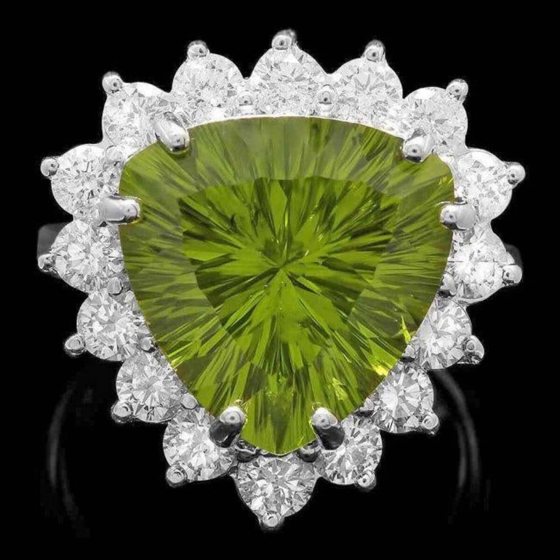 14K White Gold 9.38ct Peridot and 1.60ct Diamond Ring: Retail: $12,670.00 ****** 14K White Gold 9.38ct Peridot and 1.60ct Diamond Ring ****** Metal: 14K White Gold / Total Item Weight: 8.8 Grams / Country Made: United States / / Main Stone: Peridot / Colo