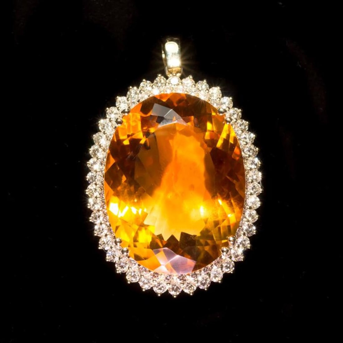 14K Gold 48.69ct Citrine 3.10ct Diamond Pendant: Retail: $27,730.00 ****** 14K Gold 48.69ct Citrine 3.10ct Diamond Pendant ****** Metal: 14K Yellow Gold / Total Item Weight: 22.9 Grams / Country Made: United States / / Main Stone: Citrine / Color: O