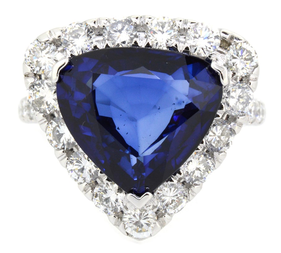 18K White Gold Ladies Ring with 7.22ct Natural Sapphire and 1.50ct tw Adjacent Diamonds: Retail: $19,500.00 ****** 18K White Gold Ladies Ring with 7.22ct Natural Sapphire and 1.50ct tw Adjacent Diamonds ****** Size: 6.5 / Metal: 18K White Gold / Total Item Weight: 8.1 Grams / Country Made