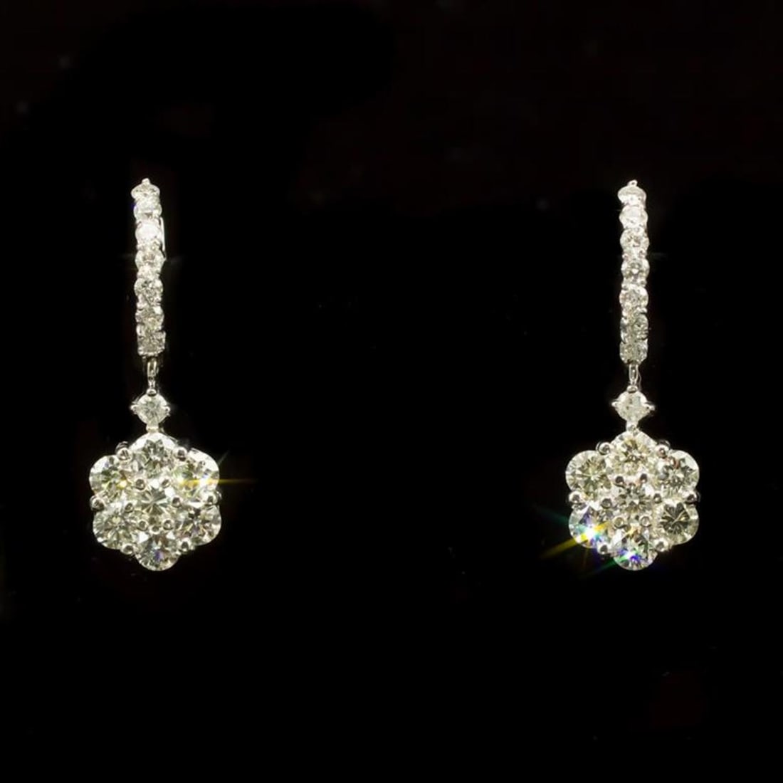 14k Gold 3.19ct Diamond Earrings: Retail: $12,170.00 ****** 14k Gold 3.19ct Diamond Earrings ****** Metal: 14k Solid White Gold / Total Item Weight: 5.7 grams / Country Made: United States / / Main Stone: Diamond / Carat Total Weight: