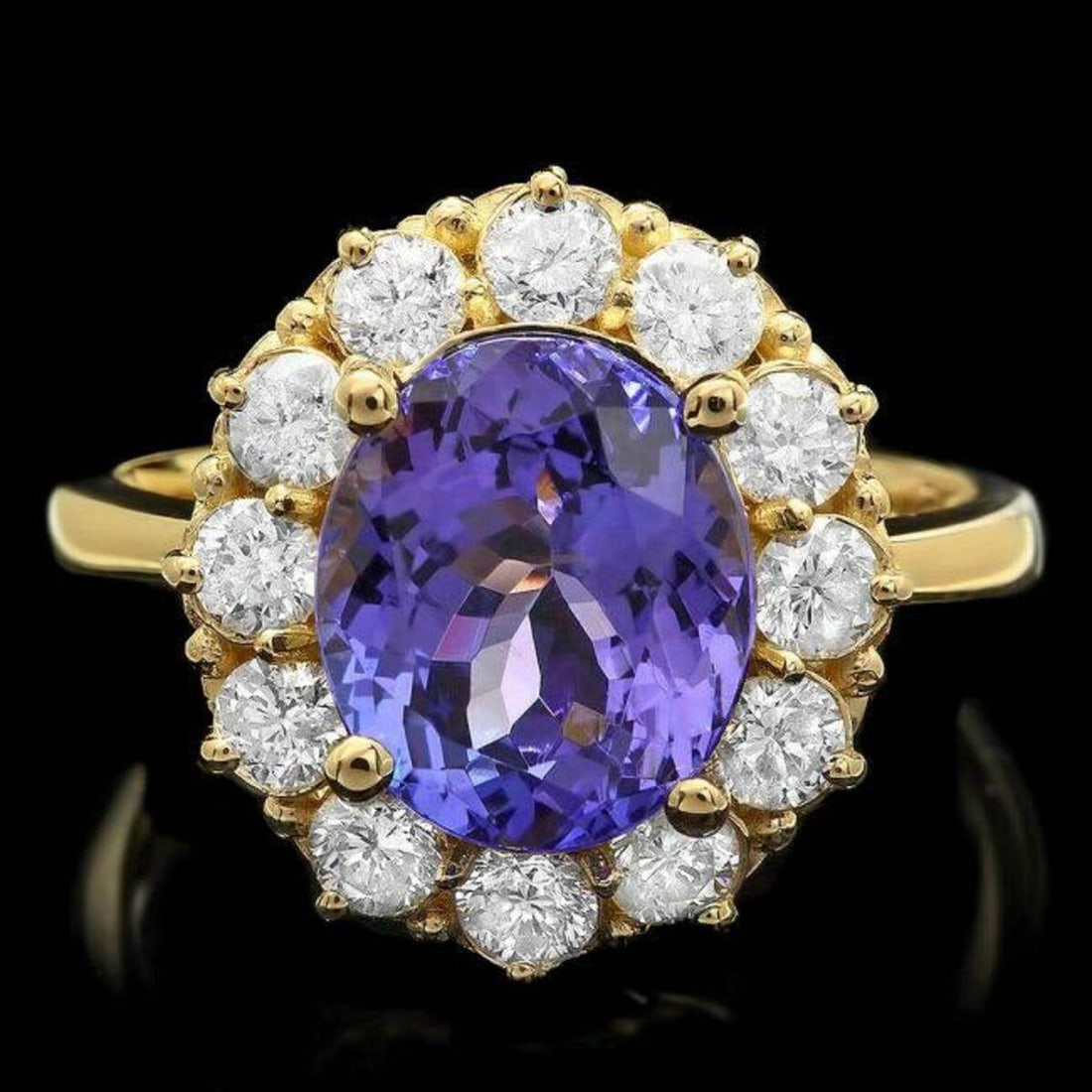 14K Yellow Gold 3.92ct Tanzanite and 0.84ct Diamond Ring: Retail: $9,768.00 ****** 14K Yellow Gold 3.92ct Tanzanite and 0.84ct Diamond Ring ****** Metal: 14K Yellow Gold / Total Item Weight: 5.5 Grams / Country Made: United States / / Main Stone: Tanzanite
