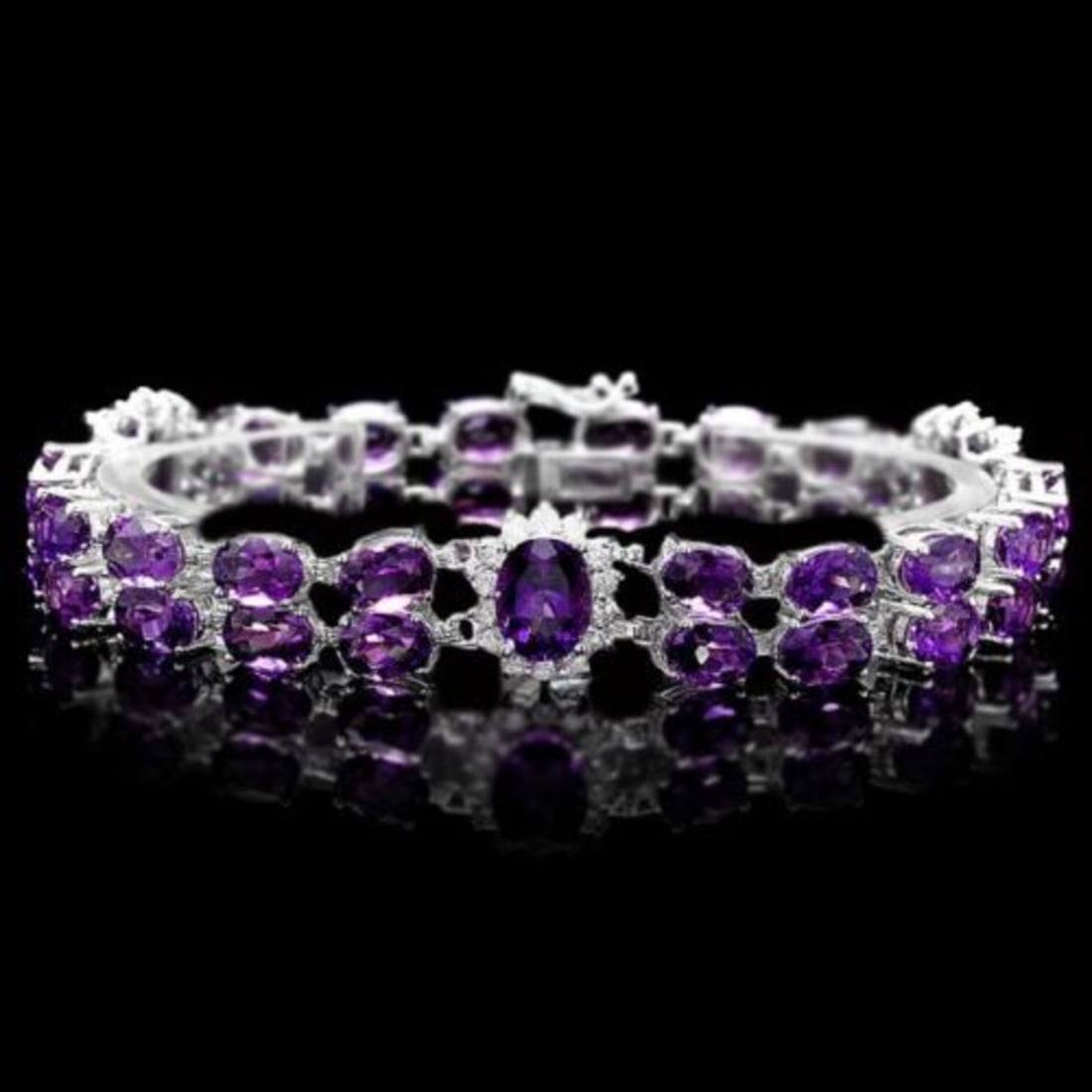 14K Gold 31.12ct Amethyst 1.35ct Diamond Bracelet: Retail: $12,525.00 ****** 14K Gold 31.12ct Amethyst 1.35ct Diamond Bracelet ****** Metal: 14K White Gold / Total Item Weight: 26.0 Grams / Country Made: United States / / Main Stone: Amethyst /