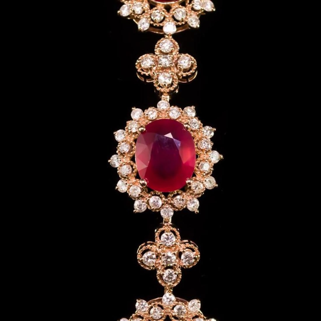 14K Gold 26.50ct Ruby 6.76ct Diamond Bracelet: Retail: $28,422.00 ****** 14K Gold 26.50ct Ruby 6.76ct Diamond Bracelet ****** Metal: 14k Solid Rose Gold / Total Item Weight: 20.5 grams / Country Made: United States / / Main Stone: Ruby / Color: Re