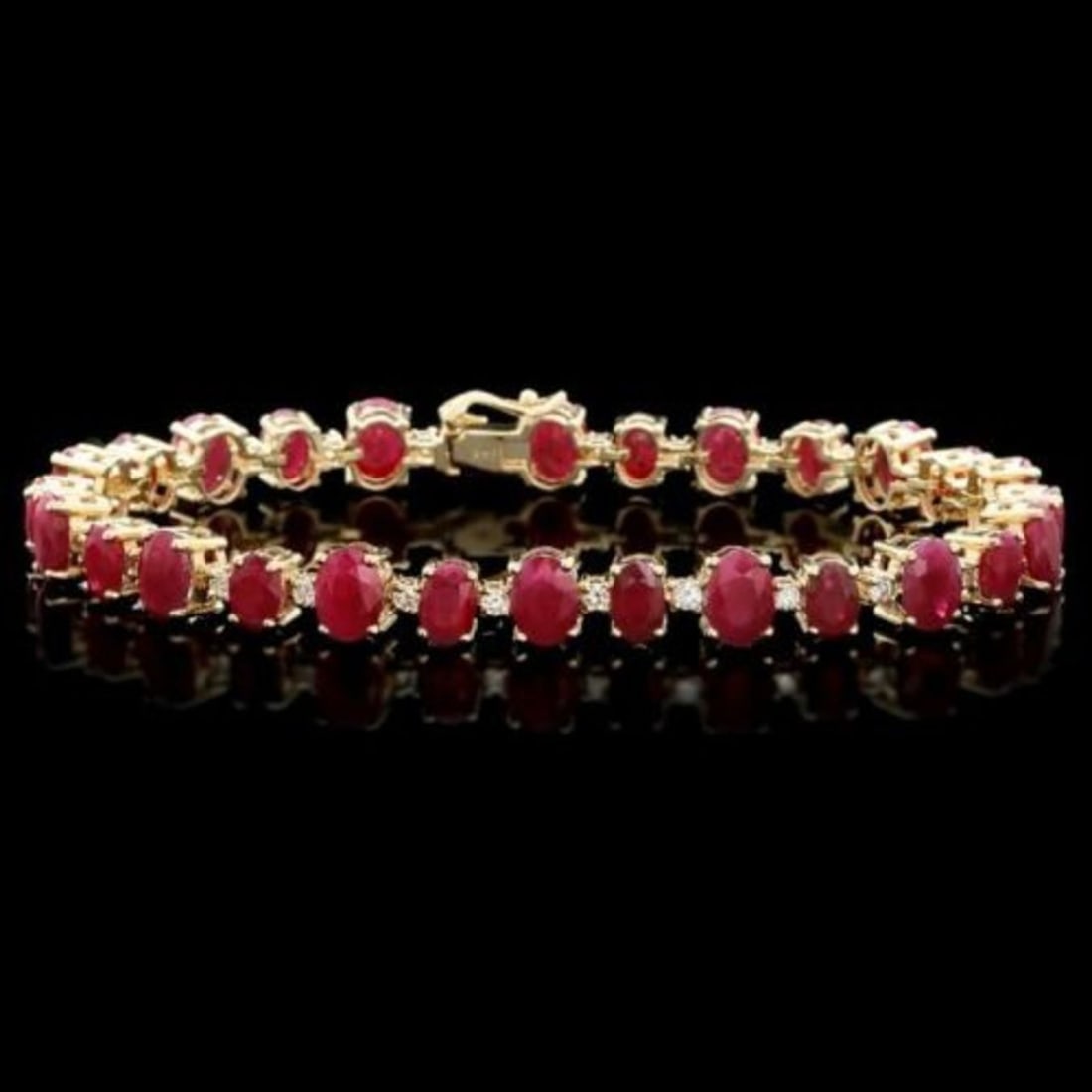 14K Gold 22.95ct Ruby 1.06ct Diamond Bracelet: Retail: $15,000.00 ****** 14K Gold 22.95ct Ruby 1.06ct Diamond Bracelet ****** Metal: 14K Yellow Gold / Total Item Weight: 19.5 Grams / Country Made: United States / / Main Stone: Ruby / Color: Red / 