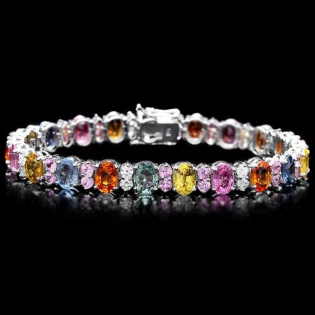 14K Gold 23.76ct Sapphire 1.21ct Diamond Bracelet: Retail: $20,430.00 ****** 14K Gold 23.76ct Sapphire 1.21ct Diamond Bracelet ****** Metal: 14K White Gold / Total Item Weight: 19.5 Grams / Country Made: United States / / Main Stone: Sapphire / Color: