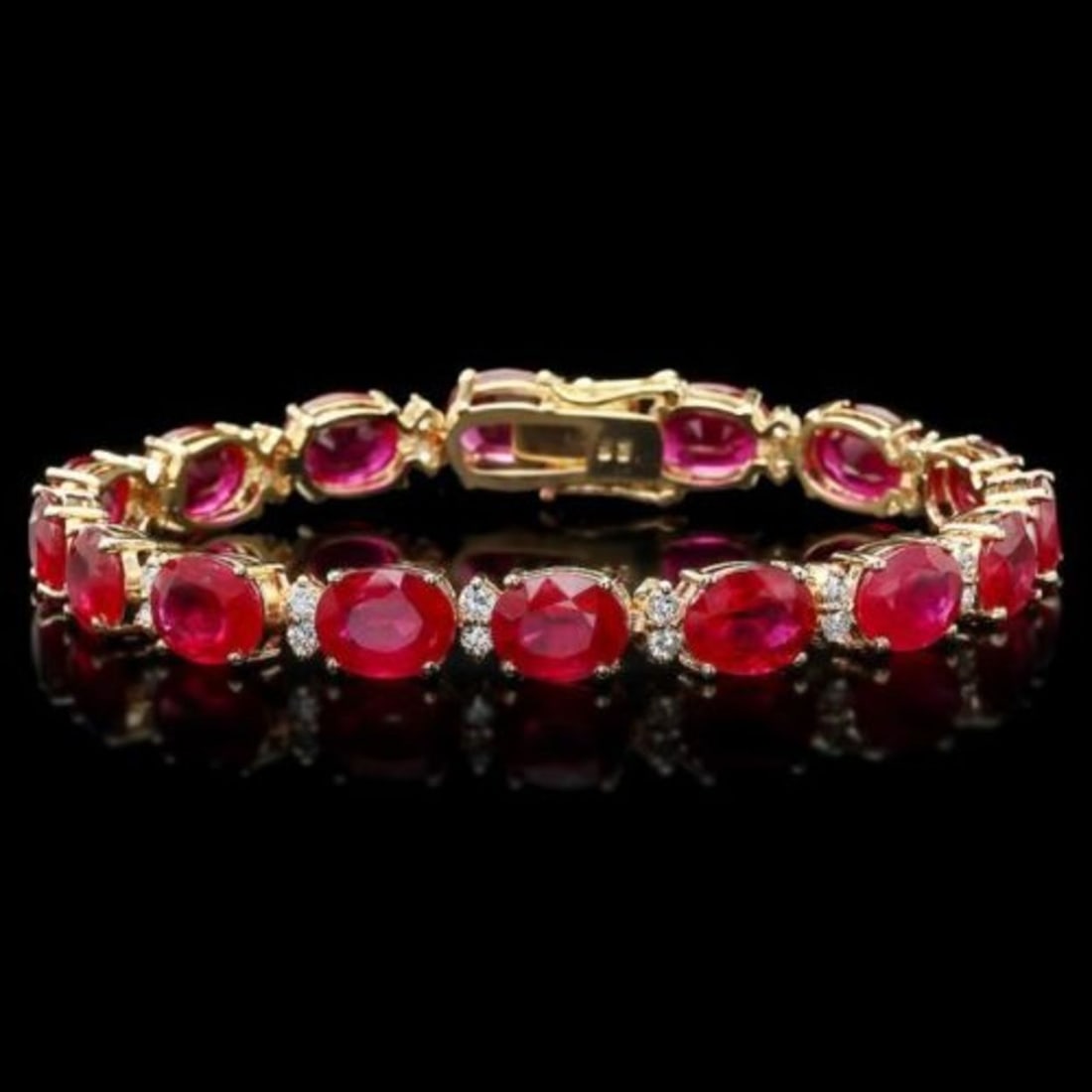14k Gold 35.99ct Ruby 1.46ct Diamond Bracelet: Retail: $18,750.00 ****** 14k Gold 35.99ct Ruby 1.46ct Diamond Bracelet ****** Size: 7.5 / Metal: 14k Solid Yellow Gold / Total Item Weight: 21.1 grams / Country Made: United States / / Main Stone: Ru