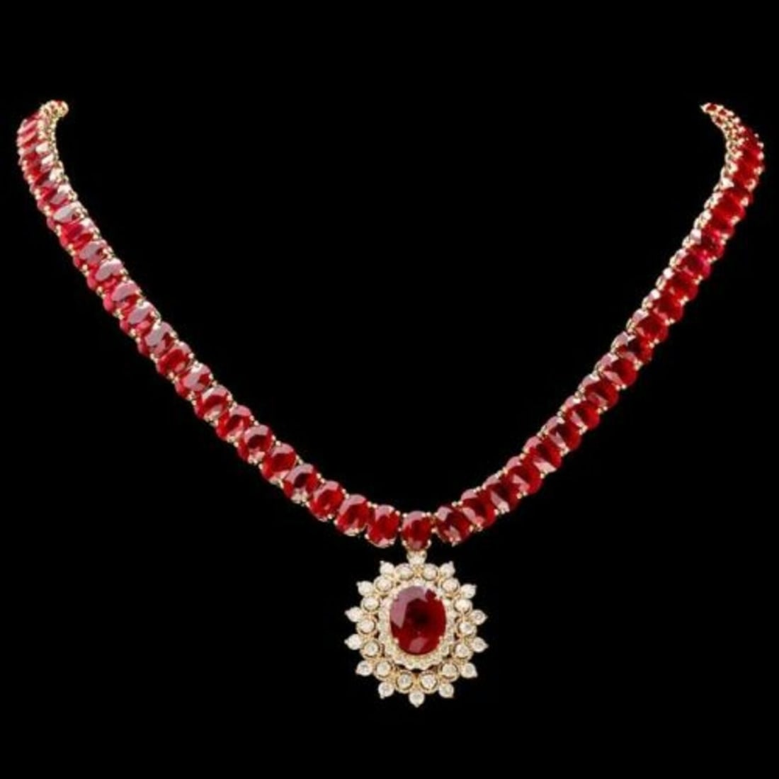 14K Yellow Gold 94.35ct Ruby and 1.60ct Diamond Necklace: Retail: $38,565.00 ****** 14K Yellow Gold 94.35ct Ruby and 1.60ct Diamond Necklace ****** Metal: 14K Yellow Gold / Total Item Weight: 51.0 Grams / Country Made: United States / / Main Stone: Ruby /