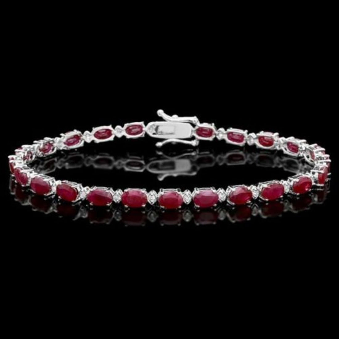 14K Gold 14.80ct Ruby 0.52ct Diamond Bracelet: Retail: $9,650.00 ****** 14K Gold 14.80ct Ruby 0.52ct Diamond Bracelet ****** Metal: 14K White Gold / Total Item Weight: 10.5 Grams / Country Made: United States / / Main Stone: Ruby / Color: Red / Ca