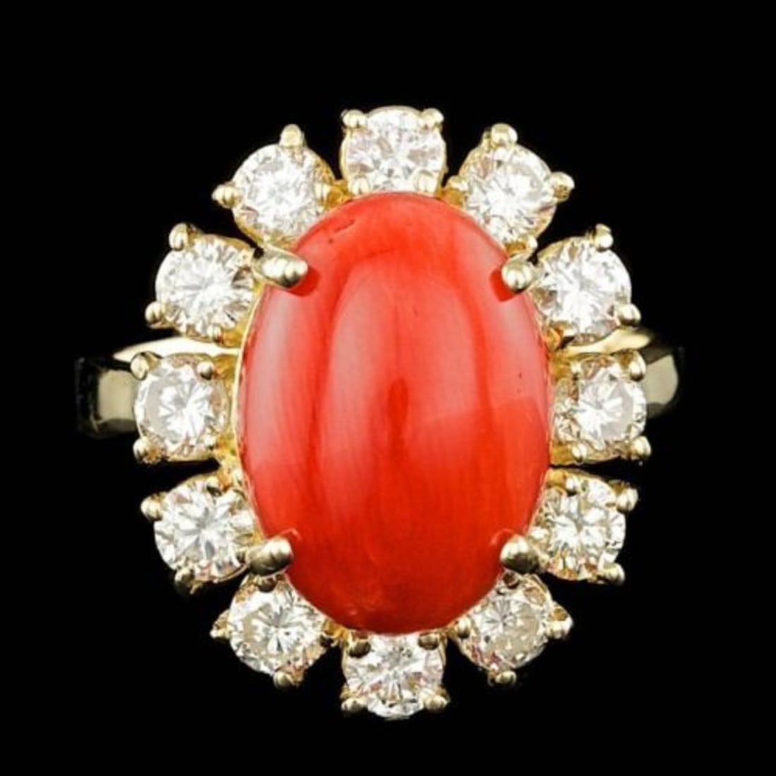 14K Yellow Gold 5.78ct Coral and 1.58ct Diamond Ring: Retail: $15,000.00 ****** 14K Yellow Gold 5.78ct Coral and 1.58ct Diamond Ring ****** Metal: 14K Yellow Gold / Total Item Weight: 7.3 Grams / Country Made: United States / / Main Stone: Coral / Color: