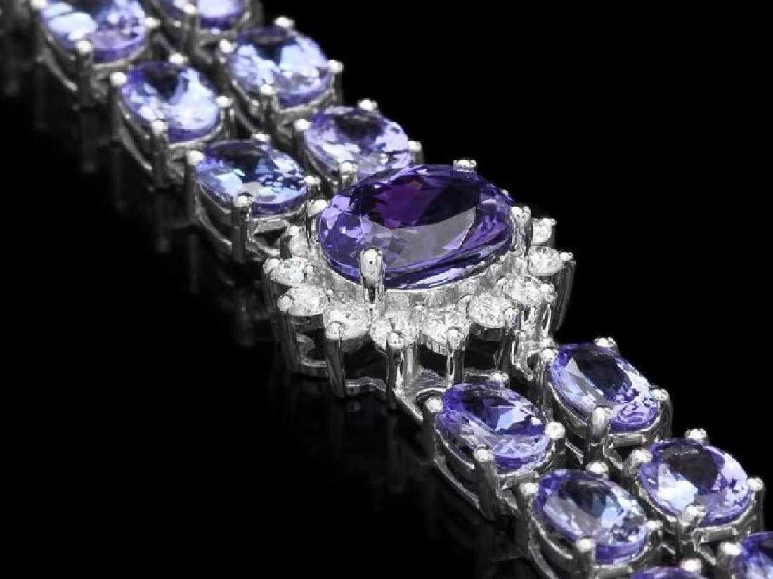 14K White Gold 21.32ct Tanzanite and 1.18ct Diamond Bracelet: Retail: $23,786.00 ****** 14K White Gold 21.32ct Tanzanite and 1.18ct Diamond Bracelet ****** Metal: 14K White Gold / Total Item Weight: 20.5 Grams / Country Made: United States / / Main Stone: