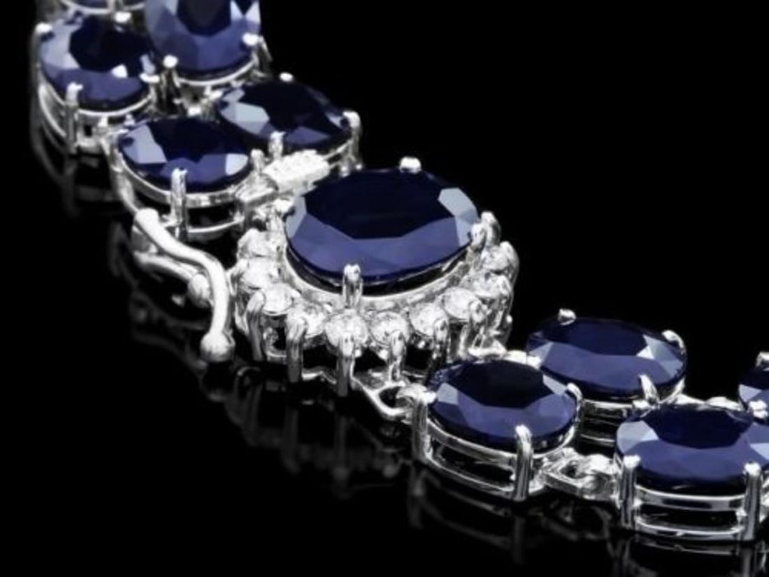 14K Gold 50.15ct Sapphire 0.49ct Diamond Bracelet: Retail: $18,075.00 ****** 14K Gold 50.15ct Sapphire 0.49ct Diamond Bracelet ****** Metal: 14K White Gold / Total Item Weight: 28.5 Grams / Country Made: United States / / Main Stone: Sapphire /