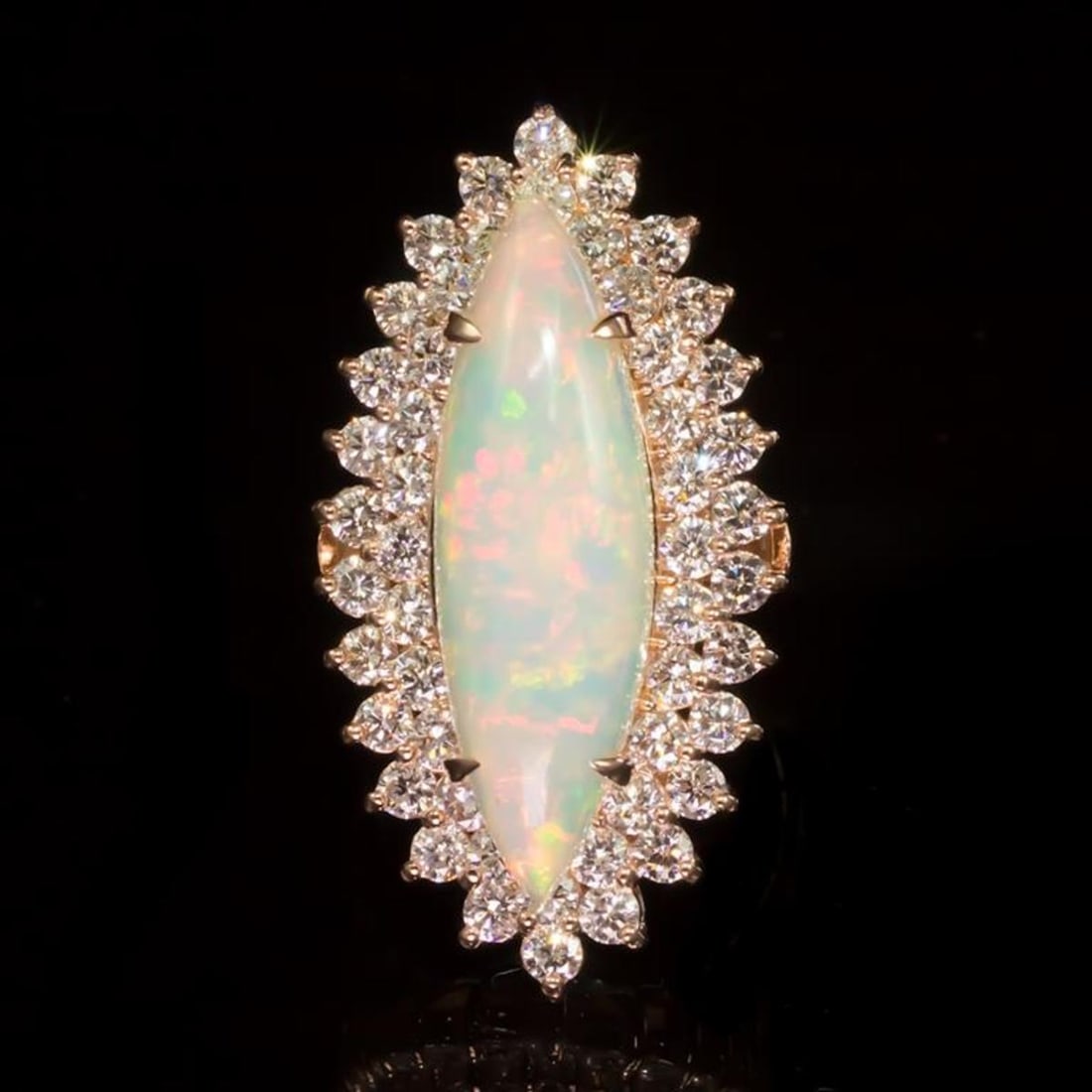 14K Rose Gold 5.51ct Opal and 2.79ct Diamond Ring: Retail: $15,100.00 ****** 14K Rose Gold 5.51ct Opal and 2.79ct Diamond Ring ****** Metal: 14K Rose Gold / Total Item Weight: 13.8 Grams / Country Made: United States / / Main Stone: Opal / Color: