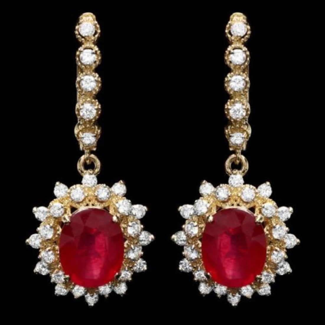 14k Gold 8.16ct Ruby 1.54ct Diamond Earrings: Retail: $8,500.00 ****** 14k Gold 8.16ct Ruby 1.54ct Diamond Earrings ****** Metal: 14k Solid Yellow Gold / Total Item Weight: 8.5 grams / Country Made: United States / / Main Stone: Ruby / Color: Red