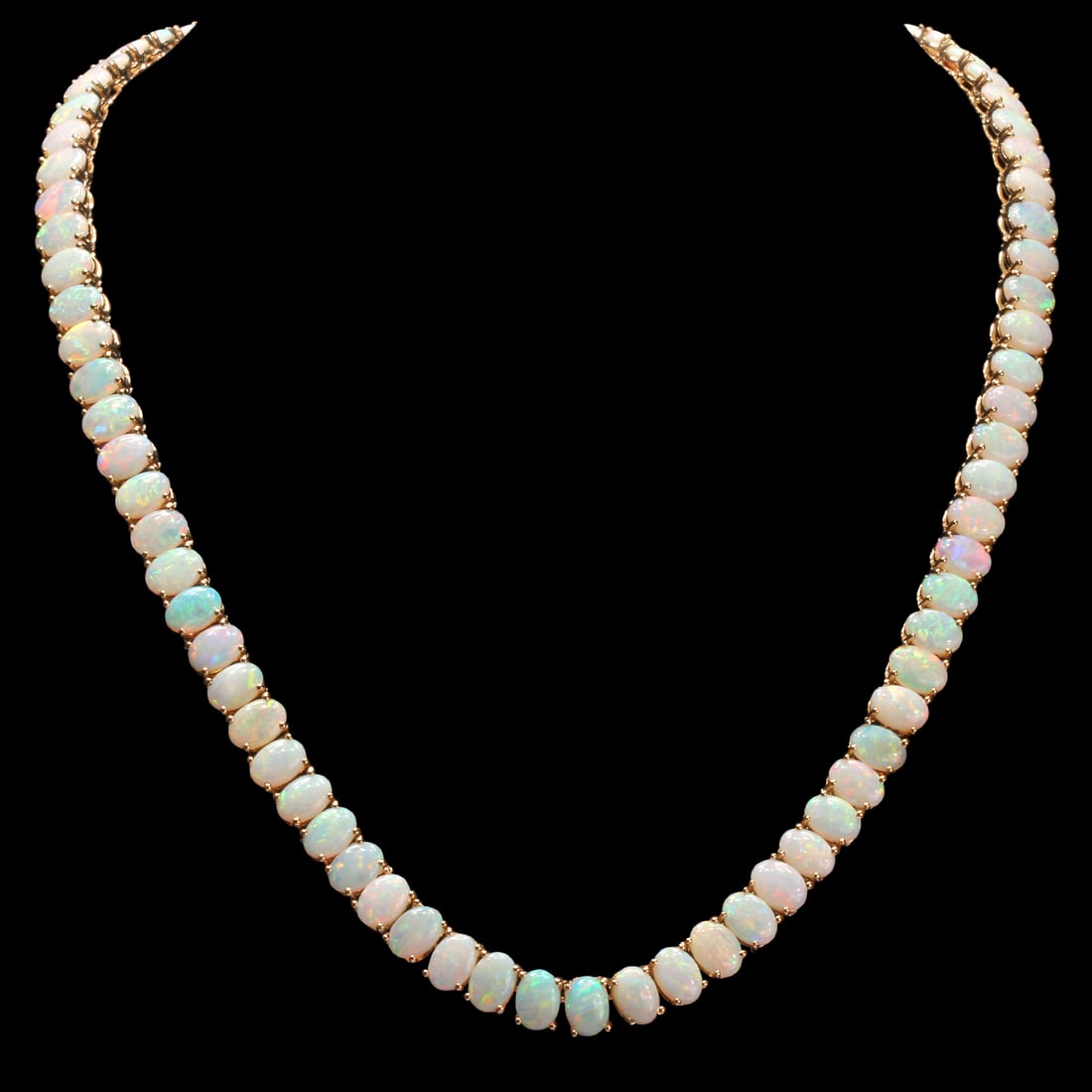 14k Yellow Gold 42.16ct Opal Necklace: Retail: $30,922.00 ****** 14k Yellow Gold 42.16ct Opal Necklace ****** Metal: 14K Yellow Gold / Total Item Weight: 33.0 grams / Country Made: United States / / Main Stone: Opal / Color: Play of Color 