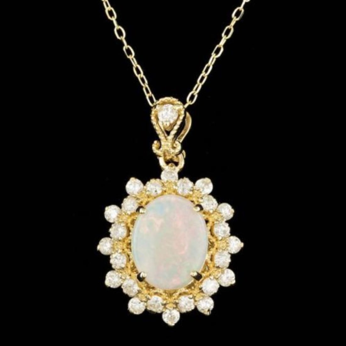 14K Gold 0.89ct Opal 0.66ct Diamond Pendant: Retail: $6,450.00 ****** 14K Gold 0.89ct Opal 0.66ct Diamond Pendant ****** Metal: 14K Yellow Gold / Total Item Weight: 4.0 Grams / Country Made: United States / / Main Stone: Opal / Color: Play of