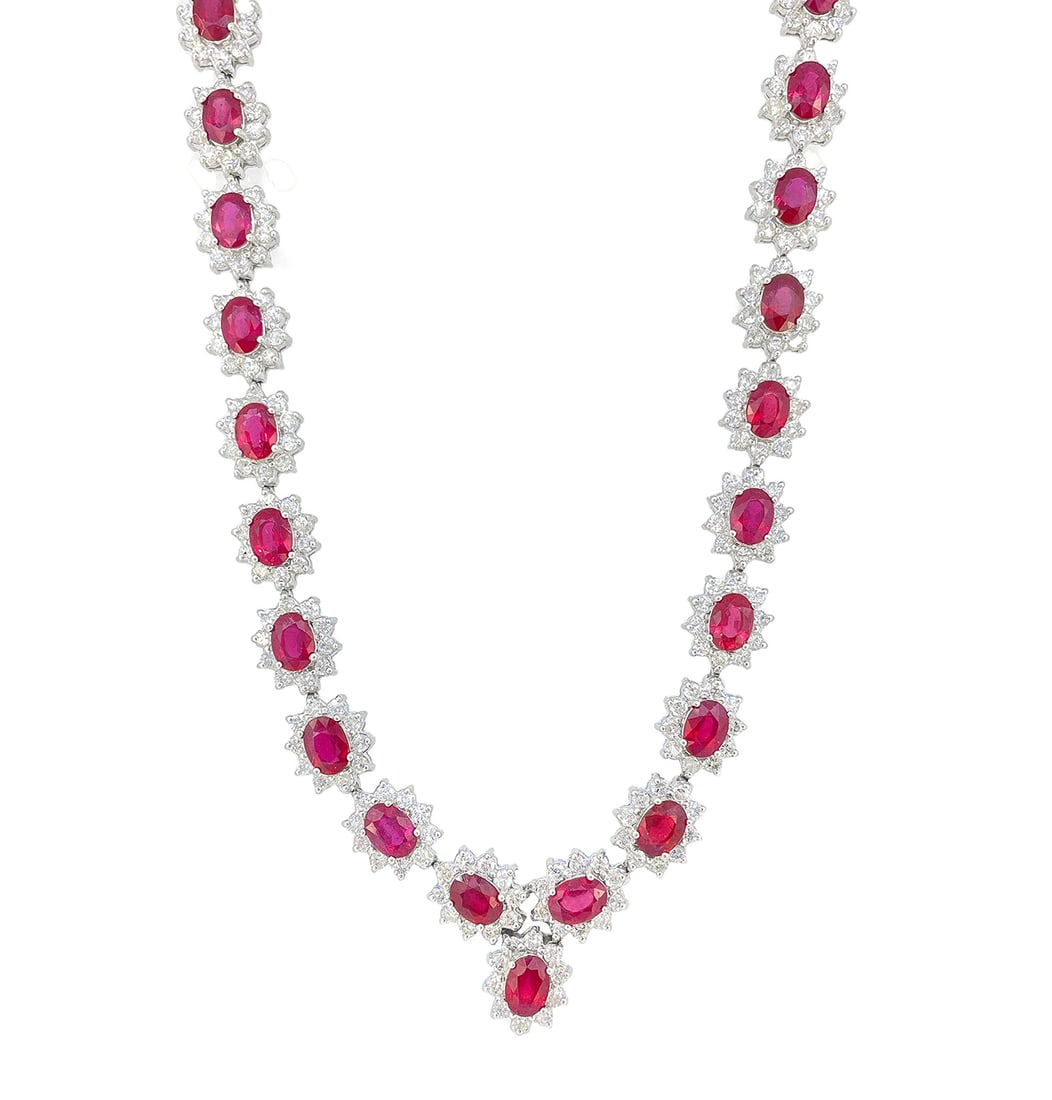 18K White Gold Ladies Necklace with 38.91ct Rubies and 13.83ct tw Adjacent Diamonds: Retail: $46,000.00 ****** 18K White Gold Ladies Necklace with 38.91ct Rubies and 13.83ct tw Adjacent Diamonds ****** Size: 16 / Metal: 18K White Gold / Total Item Weight: 69.1 Grams / Country Made: