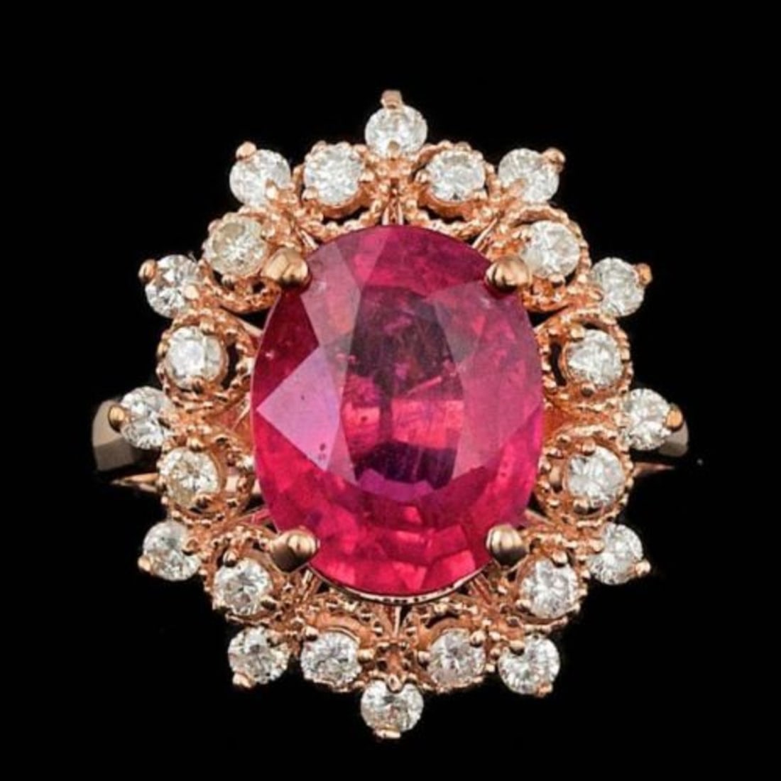 14K Rose Gold 4.23ct Ruby and 0.62ct Diamond Ring: Retail: $6,600.00 ****** 14K Rose Gold 4.23ct Ruby and 0.62ct Diamond Ring ****** Metal: 14K Rose Gold / Total Item Weight: 5.0 Grams / Country Made: United States / / Main Stone: Ruby / Color: Red /