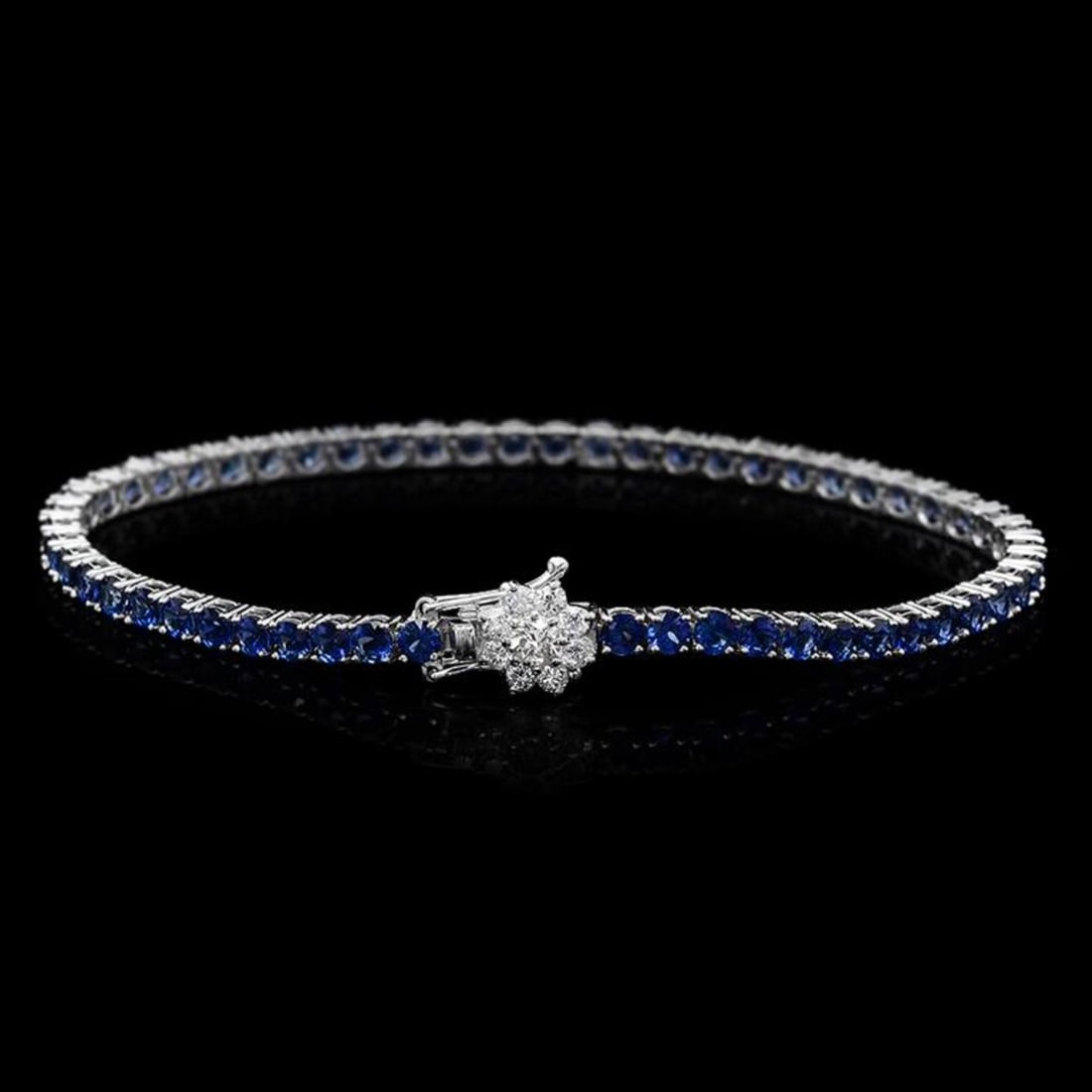 14K Gold 6.98ct Sapphire 0.54ct Diamond Bracelet: Retail: $6,855.00 ****** 14K Gold 6.98ct Sapphire 0.54ct Diamond Bracelet ****** Metal: 14K Solid White Gold / Total Item Weight: 10.0 grams / Country Made: United States / / Main Stone: Sapphire /