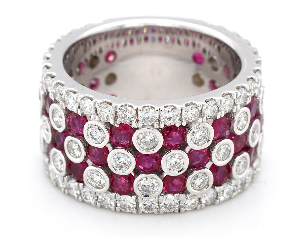 18K White Gold Ladies Band with 2.91ct tw Rubies and 2.37ct tw Diamonds: Retail: $13,500.00 ****** 18K White Gold Ladies Band with 2.91ct tw Rubies and 2.37ct tw Diamonds ****** Size: 6.5 / Metal: 18K White Gold / Total Item Weight: 14.3 Grams / Country Made: United