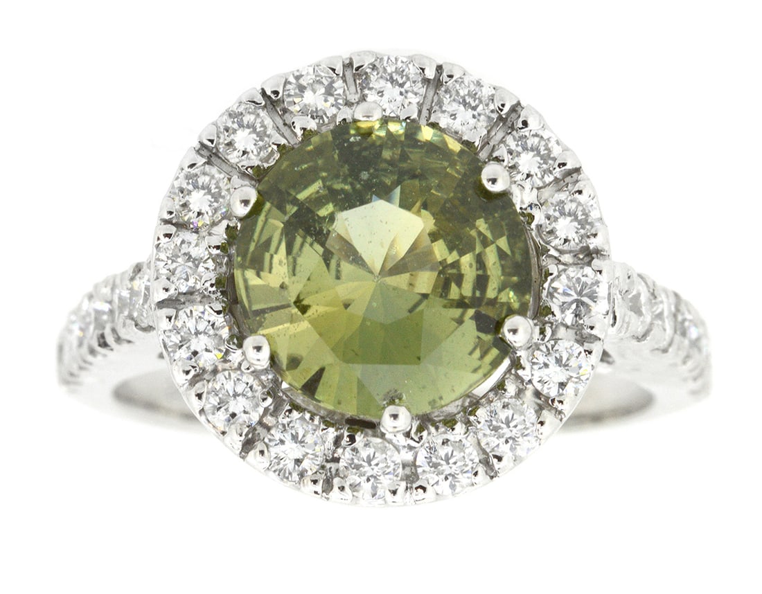 18K White Gold Ladies Ring with 2.56ct Natural Sapphire and 0.81ct tw Adjacent Diamonds: Retail: $14,000.00 ****** 18K White Gold Ladies Ring with 2.56ct Natural Sapphire and 0.81ct tw Adjacent Diamonds ****** Size: 6.5 / Metal: 18K White Gold / Total Item Weight: 6.2 Grams / Country
