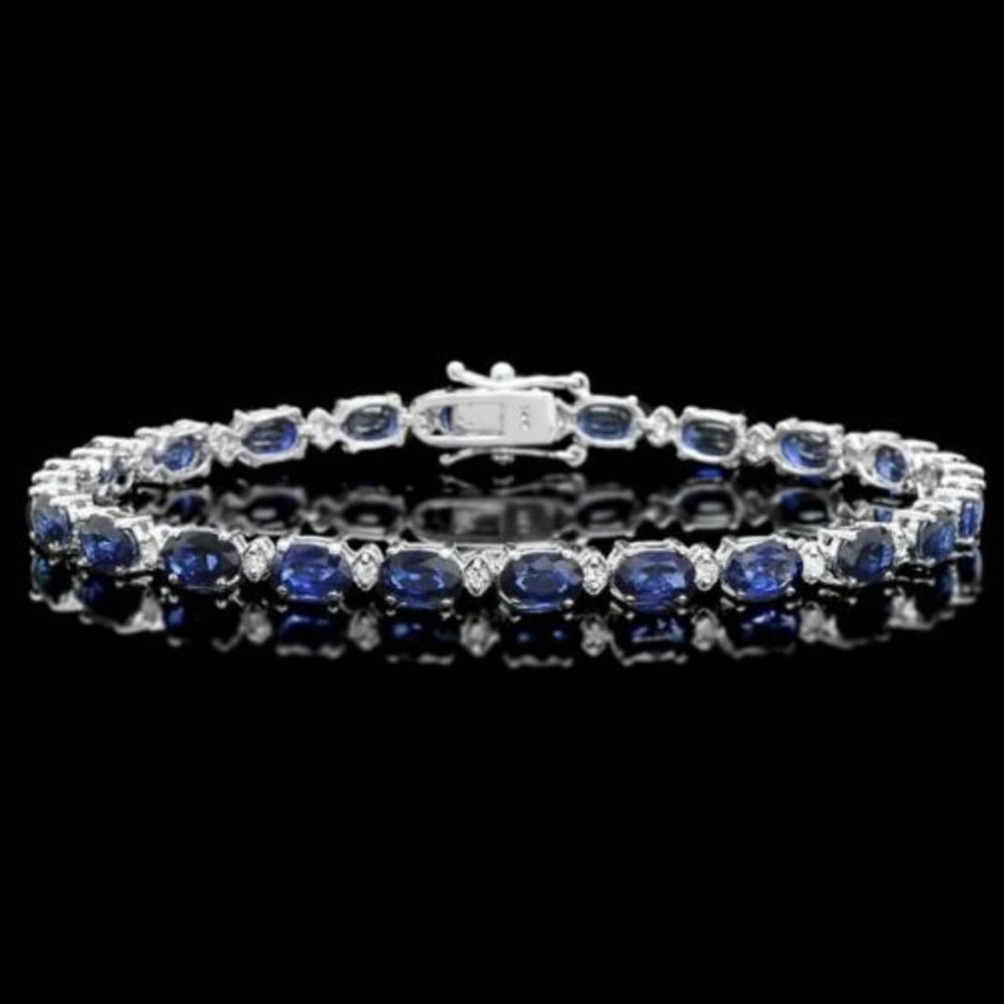 14K Gold 12.25ct Sapphire 0.47ct Diamond Bracelet: Retail: $8,595.00 ****** 14K Gold 12.25ct Sapphire 0.47ct Diamond Bracelet ****** Metal: 14K White Gold / Total Item Weight: 9.0 Grams / Country Made: United States / / Main Stone: Sapphire / Color: B