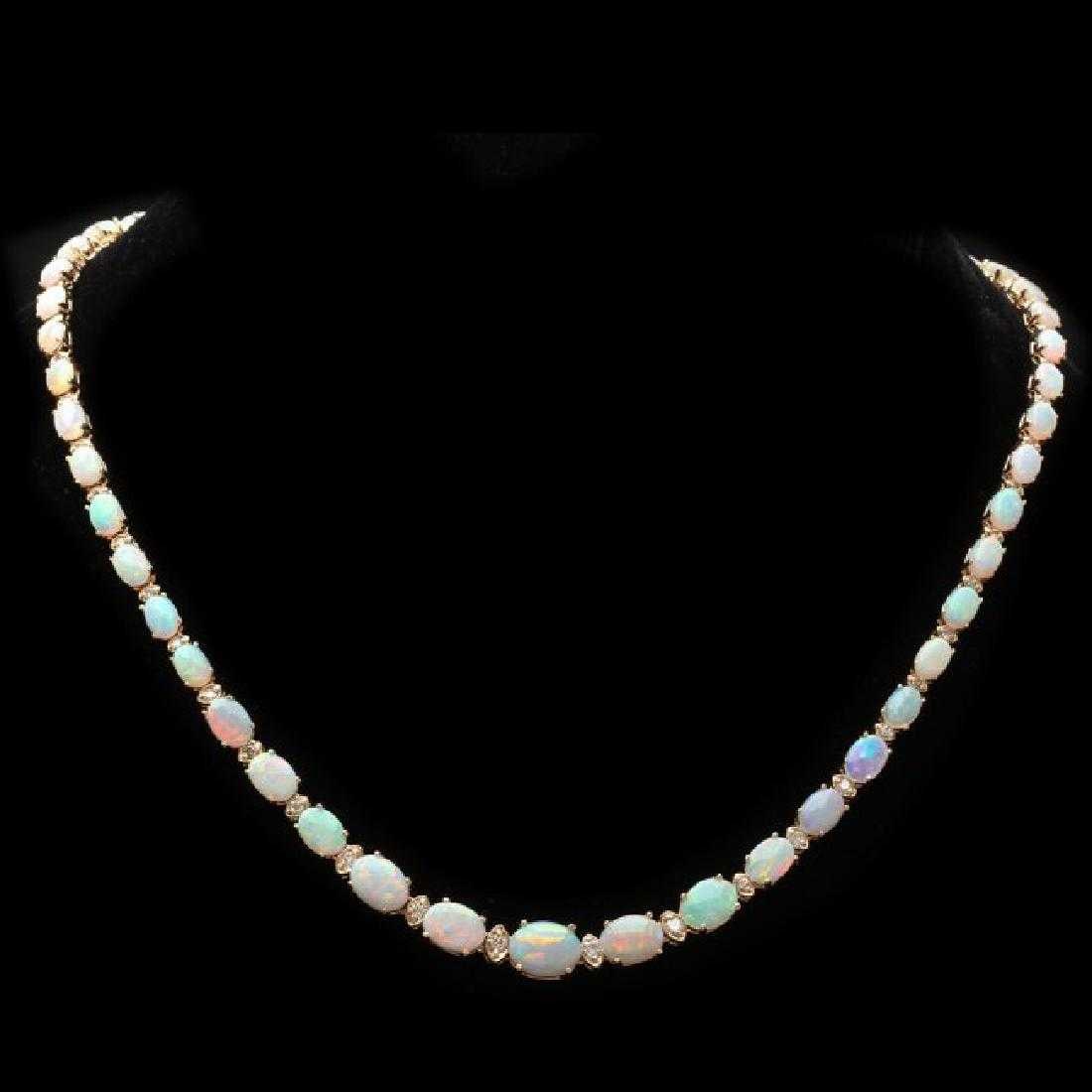 14K Yellow Gold 17.81ct Opal and 1.12ct Diamond Necklace: Retail: $8,790.00 ****** 14K Yellow Gold 17.81ct Opal and 1.12ct Diamond Necklace ****** Metal: 14K Yellow Gold / Total Item Weight: 21.0 Grams / Country Made: United States / / Main Stone: Opal /
