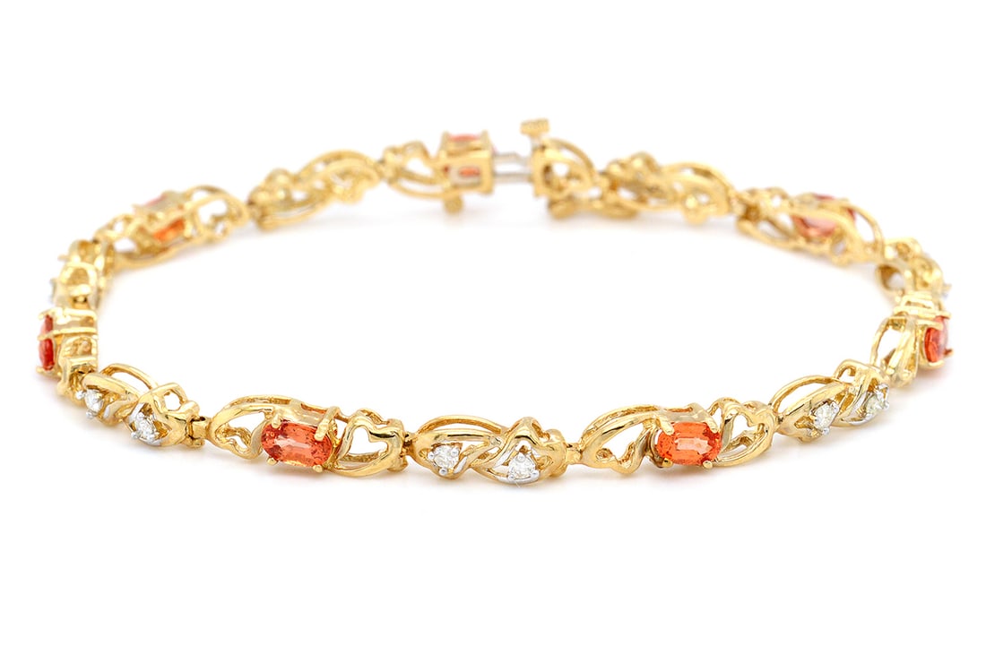 14K Yellow Gold Ladies Bracelet with 2.17tcw Orange Sapphire and 0.29tcw Diamonds: Retail: $6,500.00 ****** 14K Yellow Gold Ladies Bracelet with 2.17tcw Orange Sapphire and 0.29tcw Diamonds ****** Size: 7 / Metal: 14K Yellow Gold / Total Item Weight: 8.9 Grams / Country Made: United