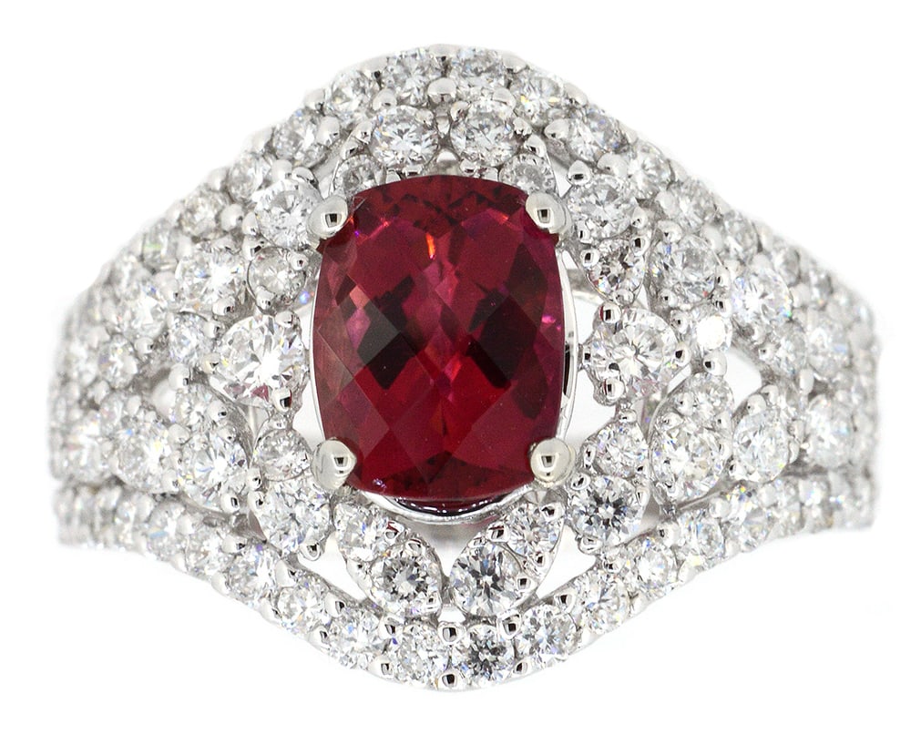 18K White Gold Ladies Ring with 1.42ct Tourmaline and 1.38ct tw Adjacent Diamonds: Retail: $5,000.00 ****** 18K White Gold Ladies Ring with 1.42ct Tourmaline and 1.38ct tw Adjacent Diamonds ****** Metal: 18K White Gold / Total Item Weight: 6 Grams / Country Made: United States / / M