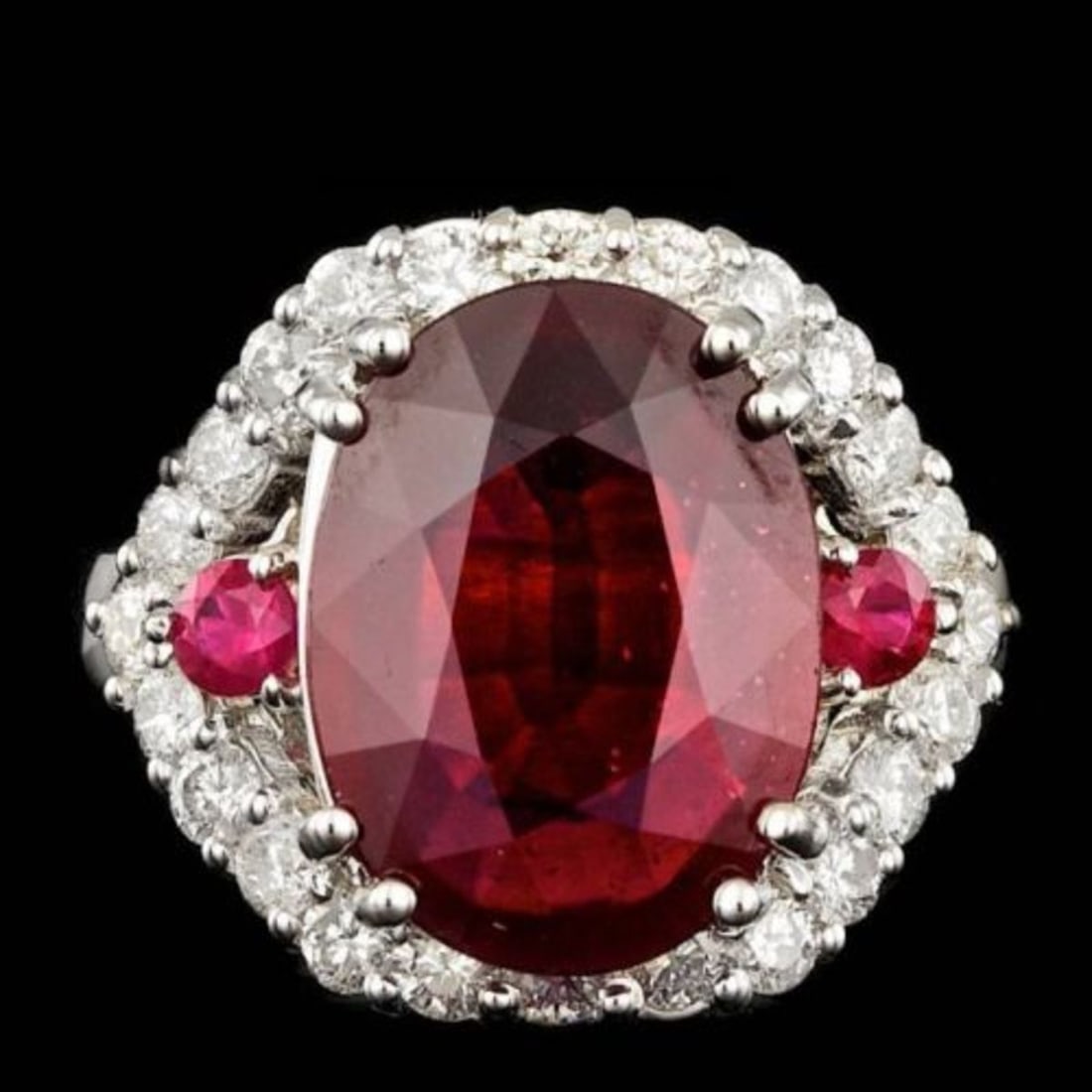 14K White Gold 7.51ct Ruby and 1.26ct Diamond Ring: Retail: $10,765.00 ****** 14K White Gold 7.51ct Ruby and 1.26ct Diamond Ring ****** Metal: 14K White Gold / Total Item Weight: 8.0 Grams / Country Made: United States / / Main Stone: Ruby / Color: Red