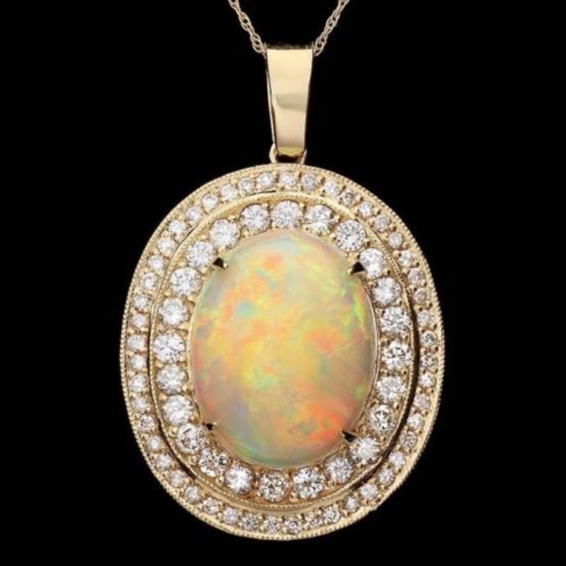 14K Gold 9.89ct Opal 2.38ct Diamond Pendant: Retail: $38,840.00 ****** 14K Gold 9.89ct Opal 2.38ct Diamond Pendant ****** Metal: 14K Yellow Gold / Total Item Weight: 11 Grams / Country Made: United States / / Main Stone: Opal / Color: Play of Co