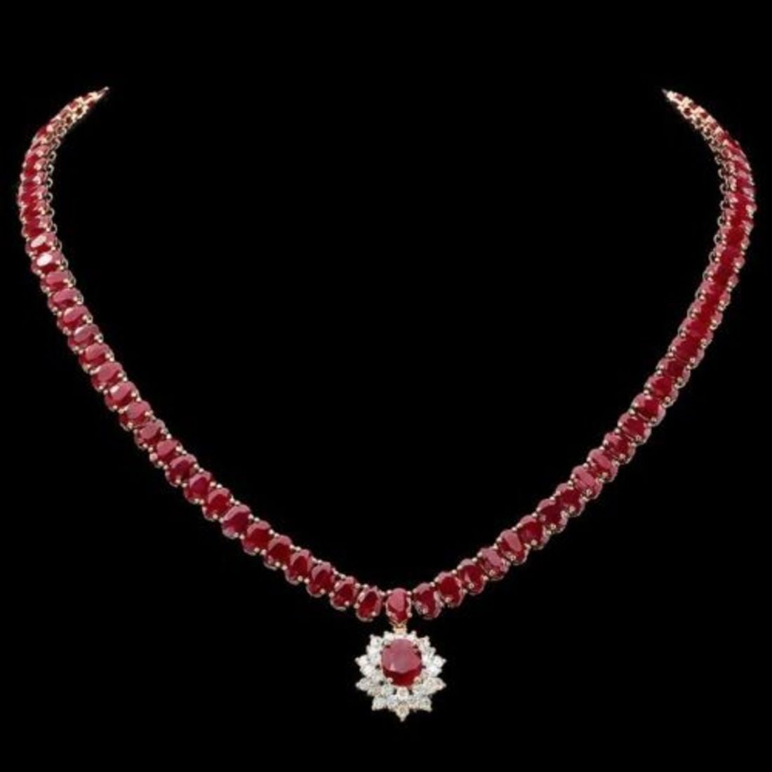 14K Yellow Gold 58.90ct Ruby and 1.25ct Diamond Necklace: Retail: $39,985.00 ****** 14K Yellow Gold 58.90ct Ruby and 1.25ct Diamond Necklace ****** Metal: 14K Yellow Gold / Total Item Weight: 35.1 Grams / Country Made: United States / / Main Stone: Ruby / Co