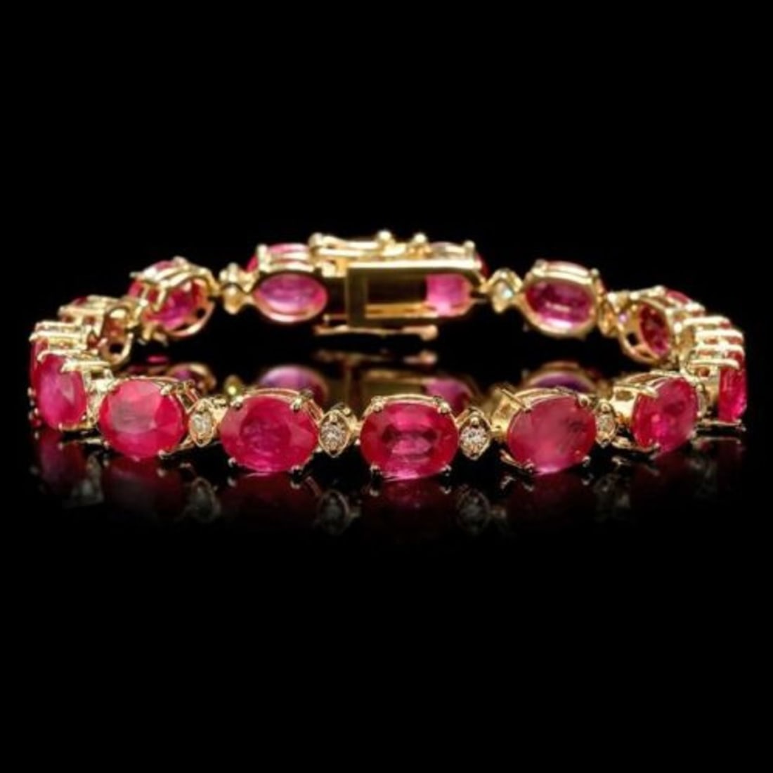 14k Gold 35.17ct Ruby 1.12ct Diamond Bracelet: Retail: $17,400.00 ****** 14k Gold 35.17ct Ruby 1.12ct Diamond Bracelet ****** Size: 7 / Metal: 14k Solid Yellow Gold / Total Item Weight: 23.0 grams / Country Made: United States / / Main Stone: Ruby
