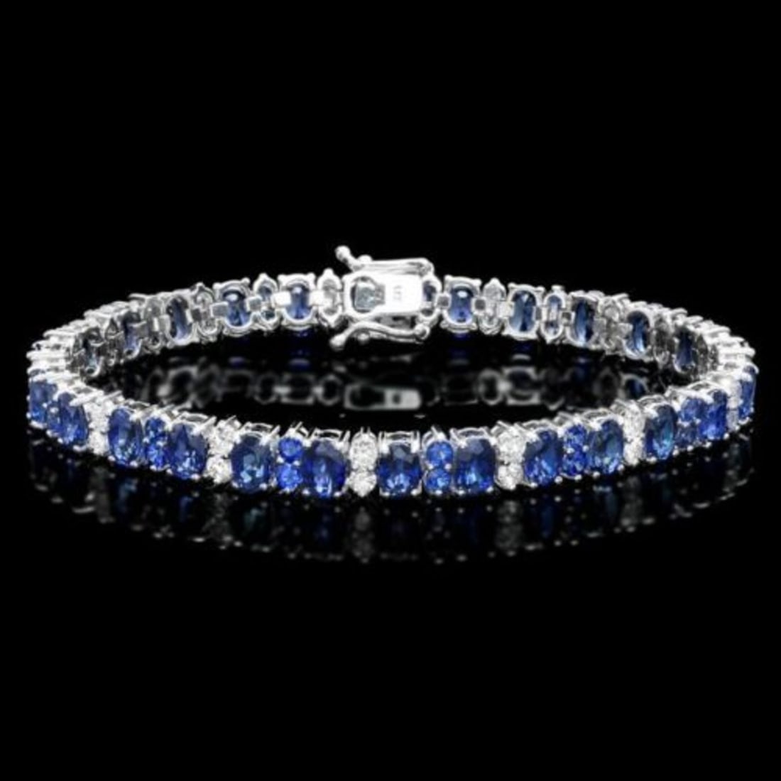 14K Gold 18.24ct Sapphire 1.87ct Diamond Bracelet: Retail: $18,950.00 ****** 14K Gold 18.24ct Sapphire 1.87ct Diamond Bracelet ****** Metal: 14K White Gold / Total Item Weight: 19.0 Grams / Country Made: United States / / Main Stone: Sapphire / Color: