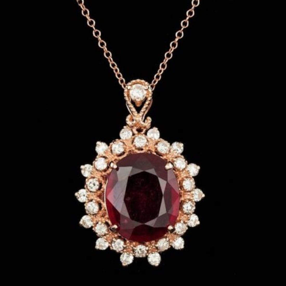 14K Gold 6.23ct Ruby 0.91ct Diamond Pendant: Retail: $6,000.00 ****** 14K Gold 6.23ct Ruby 0.91ct Diamond Pendant ****** Metal: 14K Rose Gold / Total Item Weight: 6.0 Grams / Country Made: United States / / Main Stone: Ruby / Color: Red / Carat 