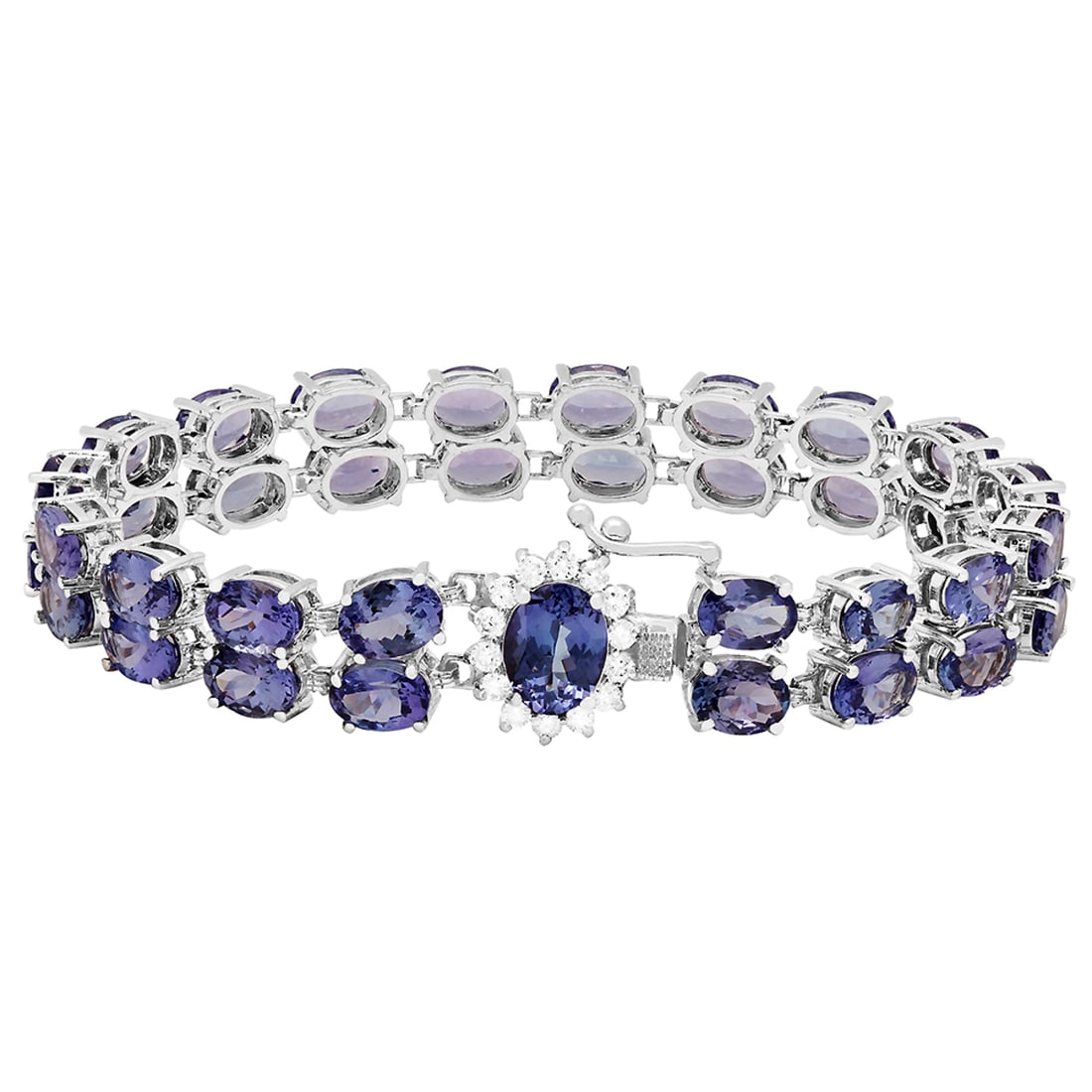 14k White Gold 29.20ct Tanzanite 0.52ct Diamond Bracelet: Retail: $16,700.00 ****** 14k White Gold 29.20ct Tanzanite 0.52ct Diamond Bracelet ****** Metal: 14K White Gold / Total Item Weight: 24.00 grams / Country Made: United States / / Main Stone: