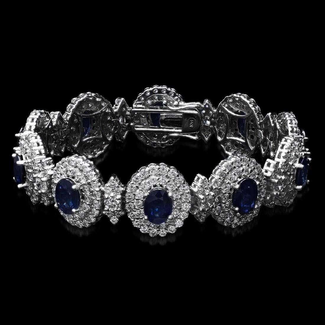 14K White Gold 21.90ct Sapphire and 12.55ct Diamond Bracelet: Retail: $83,725.00 ****** 14K White Gold 21.90ct Sapphire and 12.55ct Diamond Bracelet ****** Metal: 14K White Gold / Total Item Weight: 29 Grams / Country Made: United States / / Main Stone: Sapphire