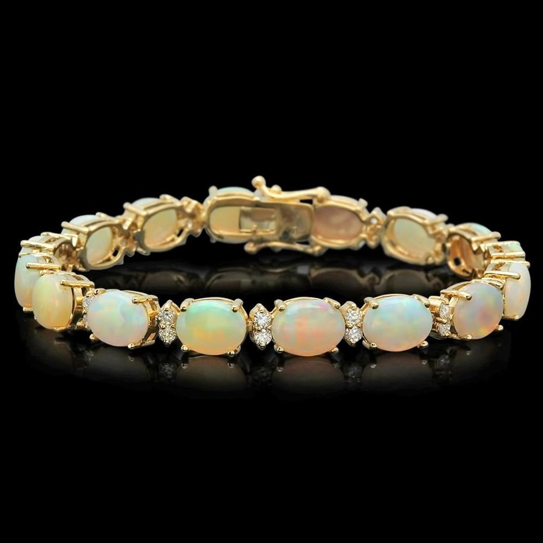 14K Gold 17.12ct Opal 1.47ct Diamond Bracelet: Retail: $14,890.00 ****** 14K Gold 17.12ct Opal 1.47ct Diamond Bracelet ****** Metal: 14K Solid Gold / Total Item Weight: 16.2 grams / Country Made: United States / / Main Stone: Opal / Color: Play