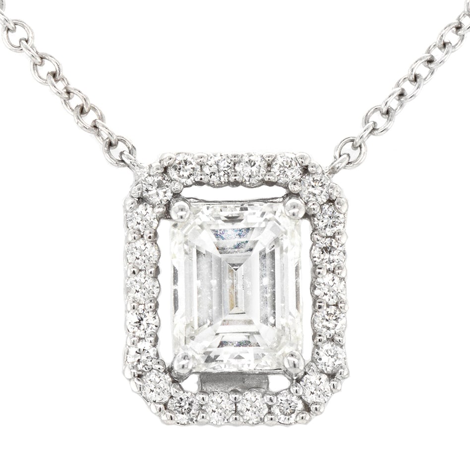 18K White Gold Ladies Necklace with 1.10ct Center Diamond and 0.20ct tw Adjacent Diamonds: Retail: $15,500.00 ****** 18K White Gold Ladies Necklace with 1.10ct Center Diamond and 0.20ct tw Adjacent Diamonds ****** Size: 16.5 / Metal: 18K white Gold / Total Item Weight: 2.8 Grams / Country