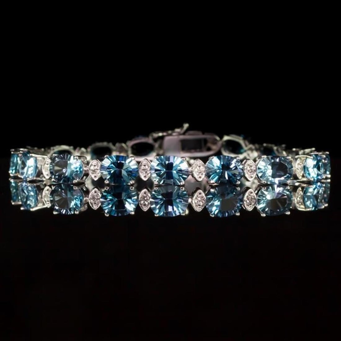 14K White Gold 24.10ct Topaz 0.75ct Diamond Bracelet: Retail: $9,566.00 ****** 14K White Gold 24.10ct Topaz 0.75ct Diamond Bracelet ****** Metal: 14K White Gold / Total Item Weight: 16.5 Grams / Country Made: United States / / Main Stone: Topaz / Color: 