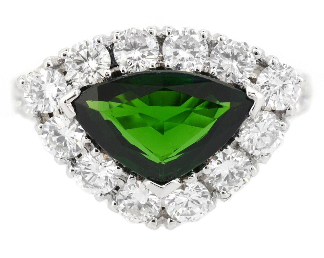 18K White Gold Ladies Ring with 2.10ct GIA Natural Tsavorite and 1.62ct tw Adjacent Diamonds: Retail: $13,500.00 ****** 18K White Gold Ladies Ring with 2.10ct GIA Natural Tsavorite and 1.62ct tw Adjacent Diamonds ****** Size: 6.5 / Metal: 18K White Gold / Total Item Weight: 7.1 Grams / Country