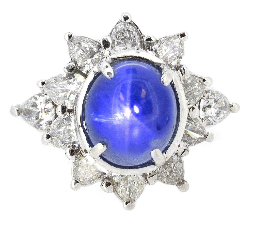 18K White Gold Ladies Ring with 9.08ct Star Sapphire and 2.40ct tw Diamonds: Retail: $32,500.00 ****** 18K White Gold Ladies Ring with 9.08ct Star Sapphire and 2.40ct tw Diamonds ****** Size: 6.5 / Metal: 18K White Gold / Total Item Weight: 11.17 / Country Made: United States