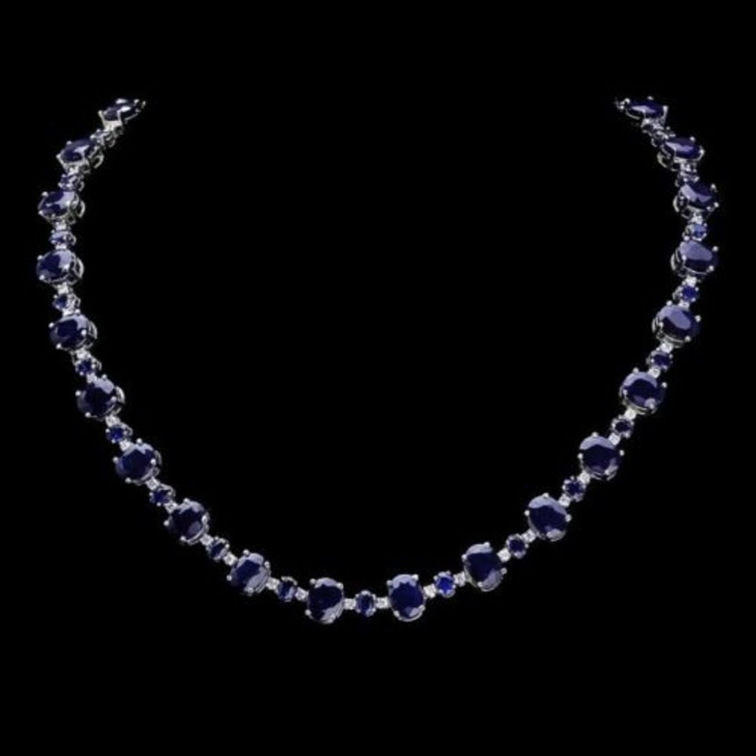 14K White Gold 56.35ct Sapphire and 1.56ct Diamond Necklace: Retail: $36,950.00 ****** 14K White Gold 56.35ct Sapphire and 1.56ct Diamond Necklace ****** Metal: 14K White Gold / Total Item Weight: 46.5 Grams / Country Made: United States / / Main Stone: