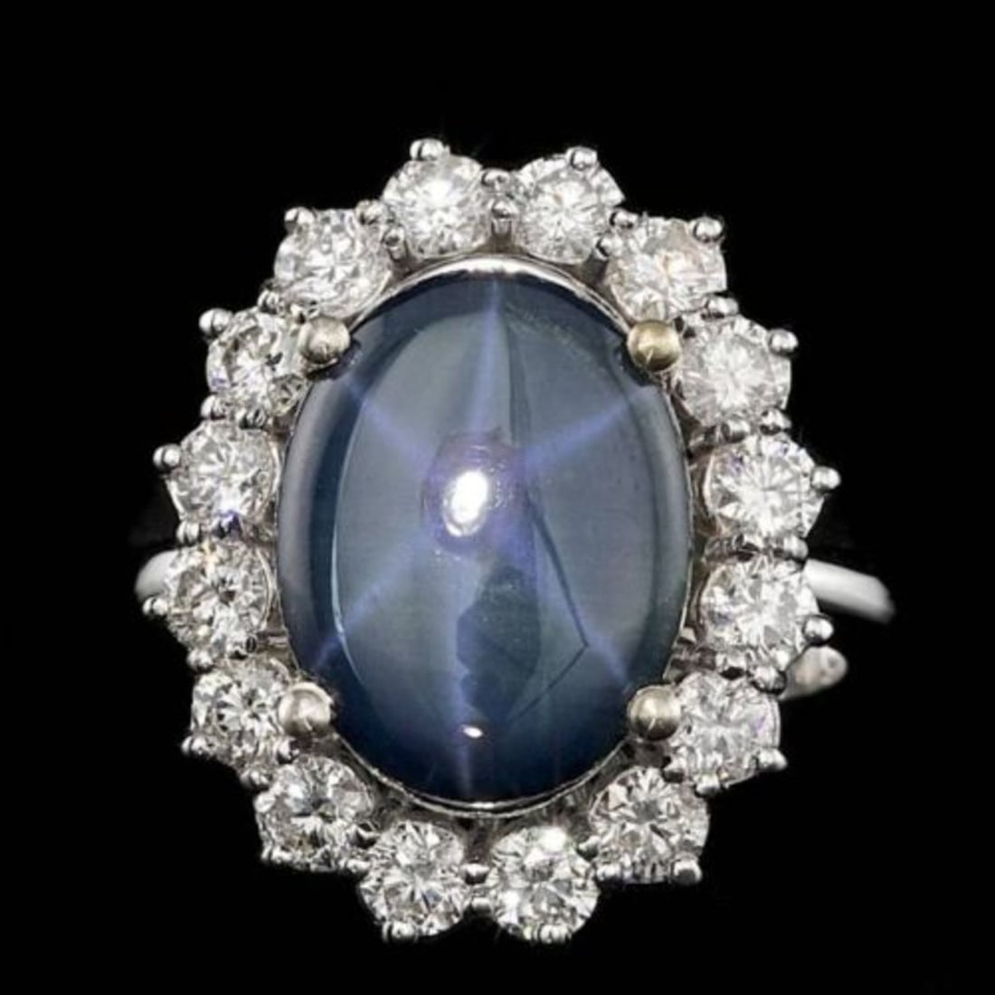 14K White Gold 5.19ct Star Sapphire and 1.46ct Diamond Ring: Retail: $14,600.00 ****** 14K White Gold 5.19ct Star Sapphire and 1.46ct Diamond Ring ****** Metal: 14K White Gold / Total Item Weight: 7.5 Grams / Country Made: United States / / Main Stone: Star