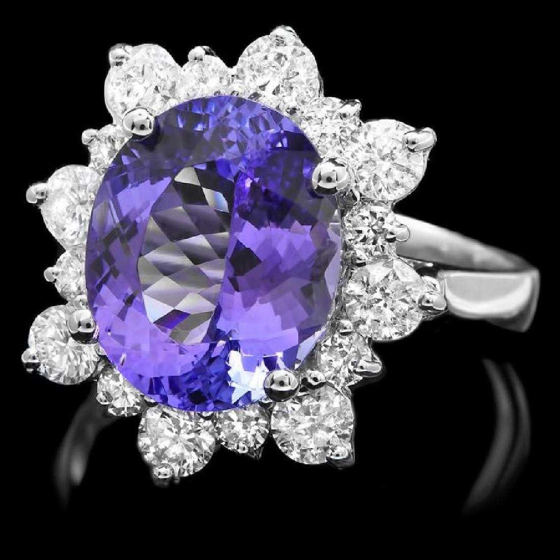 14K White Gold 4.89ct Tanzanite and 1.12ct Diamond Ring: Retail: $15,322.00 ****** 14K White Gold 4.89ct Tanzanite and 1.12ct Diamond Ring ****** Metal: 14K White Gold / Total Item Weight: 6.0 Grams / Country Made: United States / / Main Stone: Tanzanite / 